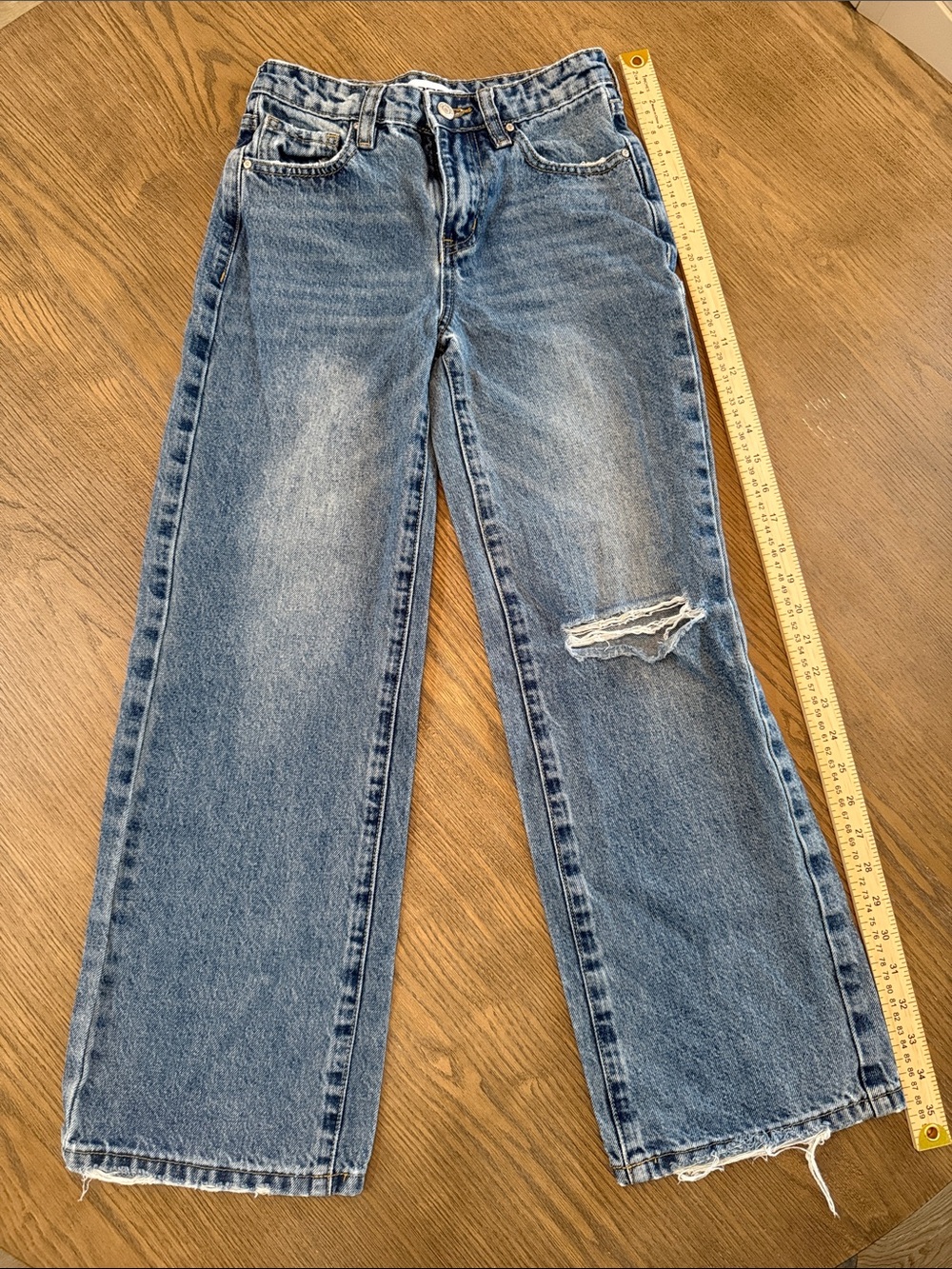 RSQ Girls Wide Leg Jeans in Medium Blue with Distressed Knee and bottom hem